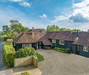 A three bedroom cottage in a fantastic village location with impressive countryside views and south facing private garden. - Photo 2