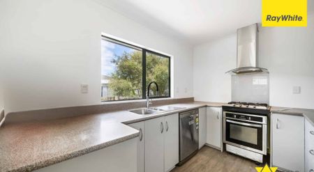 Charming 3-Bedroom Home with Decking in Handy Henderson Location - Photo 3