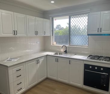 Nicely Renovated Four Bedroom - Photo 4