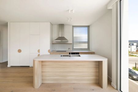 Waterfront Living at Its Finest – Stylish 1st Level Apartment - Photo 3