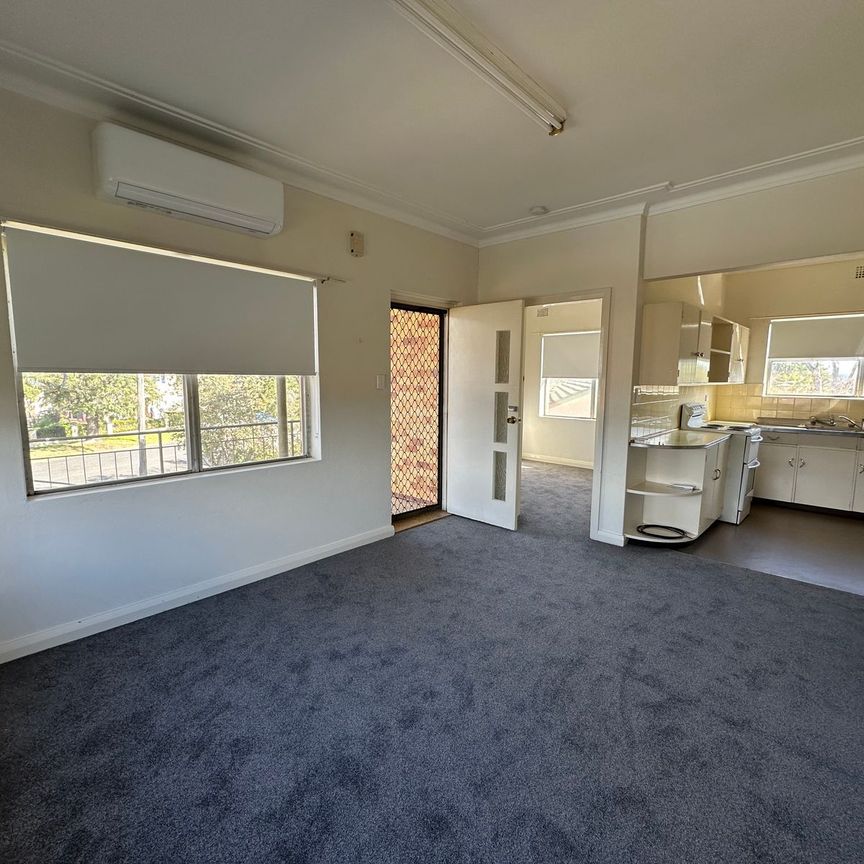 Neat and tidy two bedroom unit - Photo 1