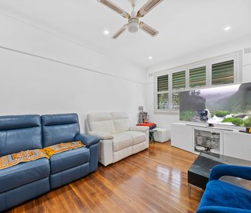 Rare offering in a central location – walk to station and shops - Photo 1