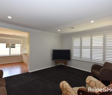 UPDATED FAMILY HOME IN CLOSE PROXIMITY TO SCHOOLS, PARKS AND THE CBD - Photo 4