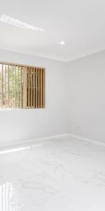 Stylishly Renovated 3-Bedroom Home - Photo 4