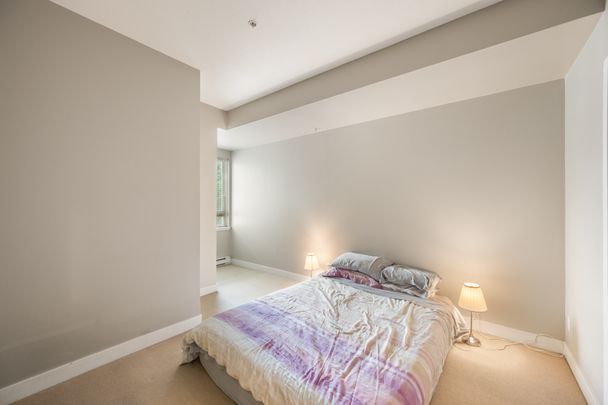 Bright Two Bedroom + Den + Solarium! - Photo 1