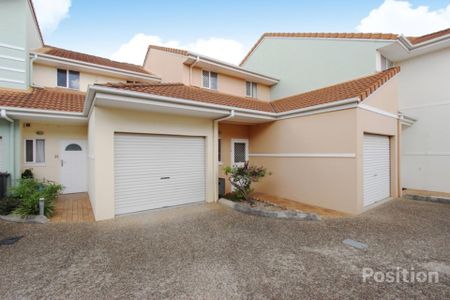 Two Ensuite Bedrooms, Balcony and Private Yard! - Photo 4