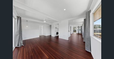 Spacious Renovated Home with Flexible Dual-Living Potential! - Photo 2