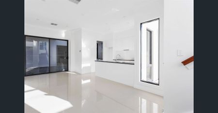 A beautiful home with a double garage, short drive to city and the bay - Photo 2