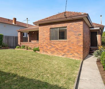 Spacious Full-Brick Home with Large Garage and Prime Punchbowl Loca... - Photo 4