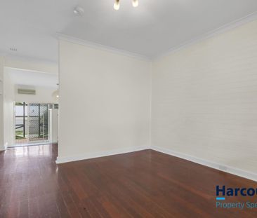 Charming 2-Bedroom Home with Spacious Backyard - Photo 1