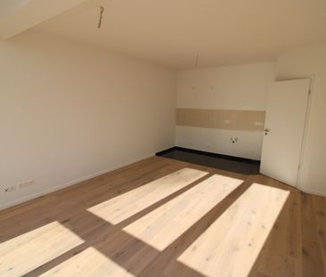 Erstbezug – Exklusiver Neubau im Zentrum mit Balkon, Fußbodenheizun... - Photo 6