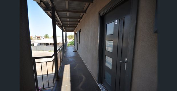 LOW MAINTENANCE - Upstairs 1x1 Modern Unit - Photo 1