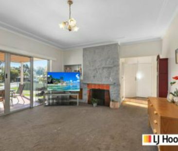Charming 3-Bedroom Home with Modern Comforts - Photo 1