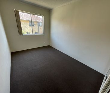 Well presented two bedroom unit with single garage in a great location! - Photo 1