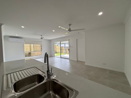 Located in a serene neighbourhood, this property is ideal for families. - Photo 2