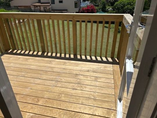 Charming 2BR Unit w/ Deck & lawn - Photo 1