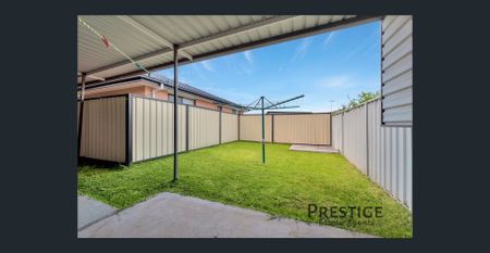 Spacious Family Home in a Prime Bossley Park Location - Photo 4