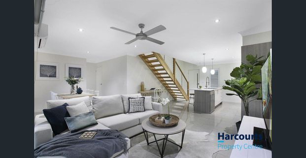 Gorgeous Three Bedroom Townhouse in Prime Location - Photo 1