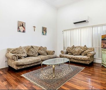 Stylish 4 Bedroom Home - Photo 1