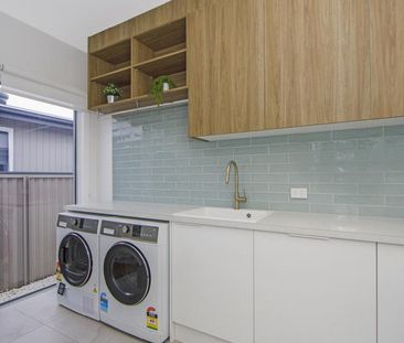 Coastal Luxury Meets Effortless Family Living - Photo 3