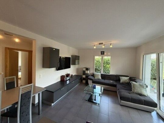 Appartement 4.5 pièces avec terrasse et pelouse privative - Photo 1