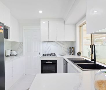 Modern Living in a Prime Glenmore Park Location - Photo 6