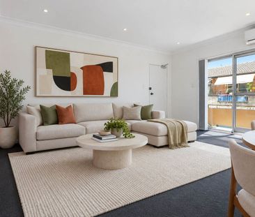 BRIGHT TOP FLOOR SPACE ON A QUIET STREET - Photo 1
