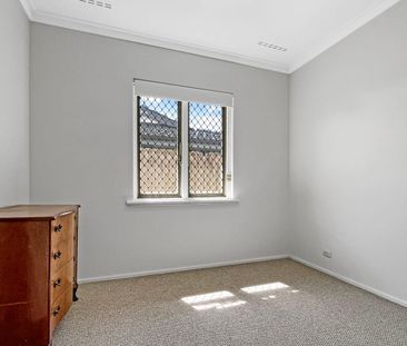 Charming Home with Comfort & Included Garden Care - Photo 2