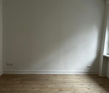 Erdgeschosswohnung im charmanten Altbau - Foto 2