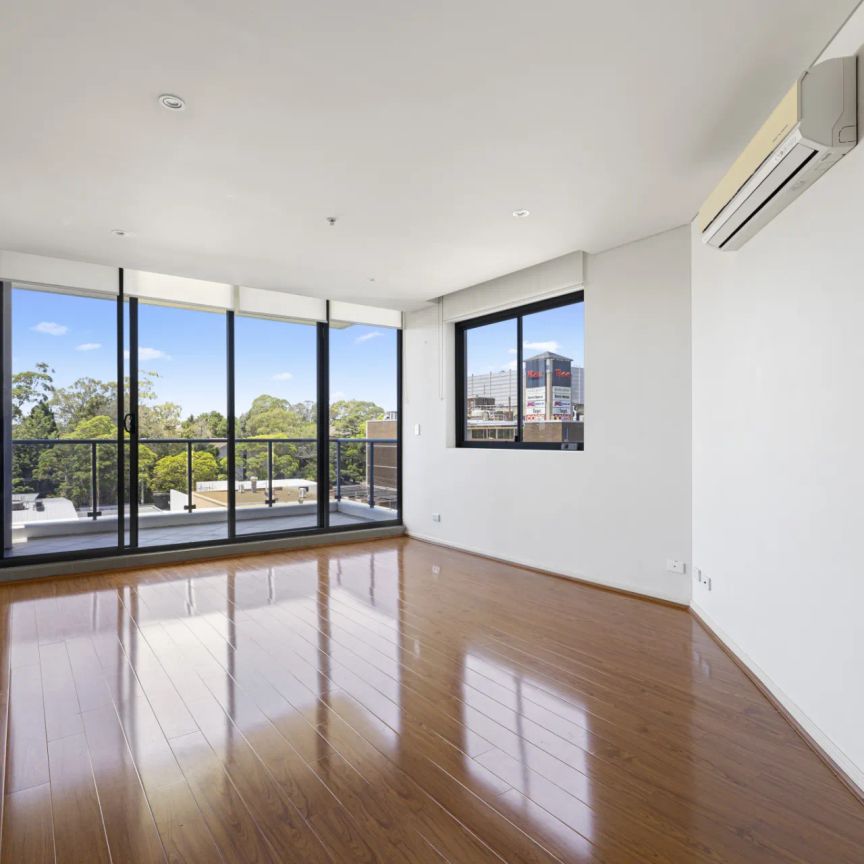 Convenient Location with Generous Living Areas - Photo 1