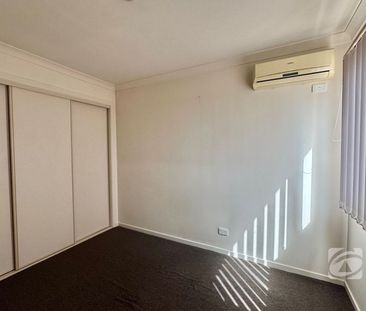 PERFECTLY LOCATED TOWNHOUSE WITH 2 FAMILY AREAS - Photo 2