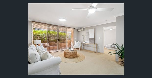 Sun-Drenched, Spacious & Convenient Living - Photo 1