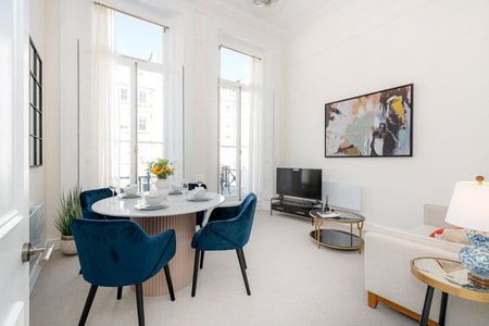 A well-presented first floor (with lift) two bedroom, two bathroom flat that benefits from its own private balcony, located on the west side of Lexham Gardens. Tenancy Length: Minimum 12 months EPC Rating C | Council Tax Band F - Photo 2