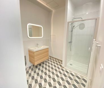 A LOUER APPARTEMENT 2 CHAMBRES CENTRE VILLE DE ST QUENTIN 02100 - Photo 2