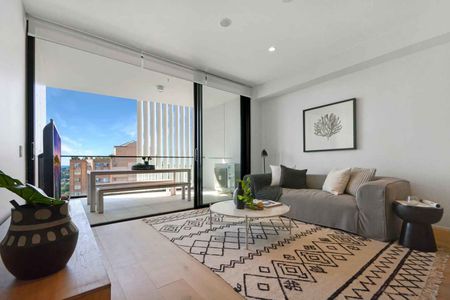 BEAUTIFULLY APPOINTED NORTH FACING APARTMENT WITH PARKING - Photo 3