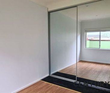 Spacious 4-Bedroom Family Home in a Great Location! - Photo 6