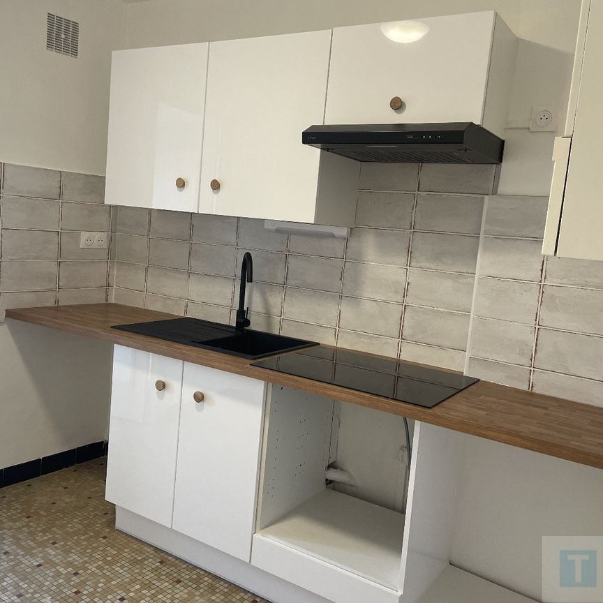 Location Appartement 2 pièces 51m² LANNEMEZAN 65300 - Photo 1
