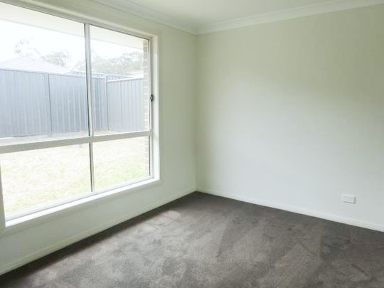 Neat 2-Bedroom Duplex - Water included - Photo 1