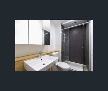 Stylish Inner-City Apartment with Resort-Style Facilities - Photo 4