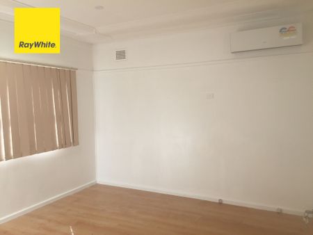 Spacious 4-Bedroom Home in a Convenient Location! - Photo 2