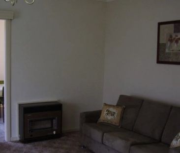 Spacious Three-Bedroom Home in a Prime Location - Photo 1