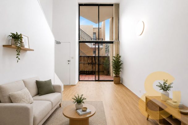Modern Loft-Style 1-Bedroom with Courtyard in Prime Location - Photo 1