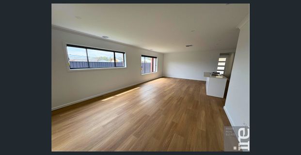 Impressive Brand New Four-Bedroom Residence in Warby Views Estate! - Photo 1