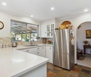 Stunning Riverside Views with Lagoon Style Pool - Photo 1
