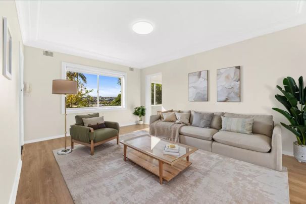 SPACIOUS TWO BEDROOM APARTMENT WITH PANORAMIC DISTRICT AND WATER VIEWS - Photo 1