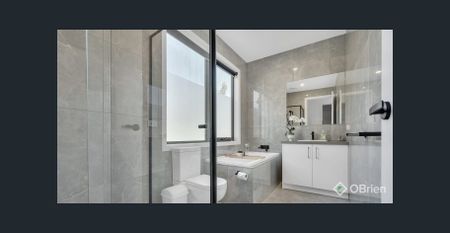 Modern 4-Bedroom Retreat Minutes from the Beach - Photo 4