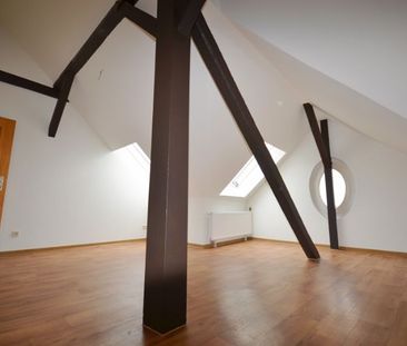 Charmante und großzügige Dachgeschosswohnung! - Foto 1