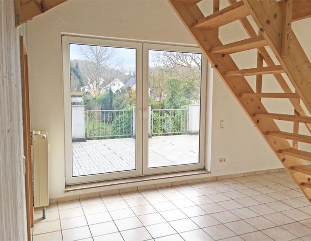 Dachgeschosswohnung mit Extras! - Foto 1