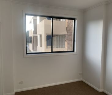 Spacious Bedrooms plus security car space Apartments available now - Photo 2
