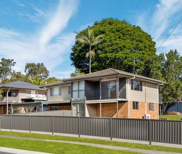 Attractive High-Set with Multiple Living Spaces - Photo 4